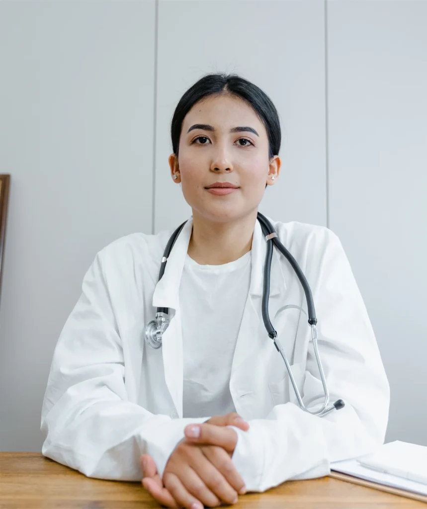 DOCTOR FRONT FACE ON TABLE